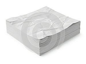 Stack of crumpled white paper sheets