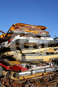 Stack of crushed cars photo