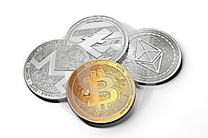 Stack of cryptocurrencies: bitcoin, ethereum, litecoin, monero, dash, and ripple coin together, isolated on white.