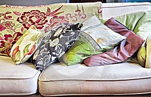 Stack of cushions on sofa