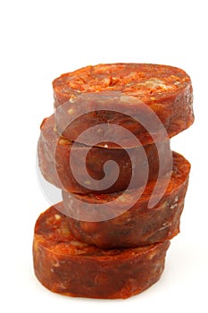 Stack of cut chorizo sausage pieces