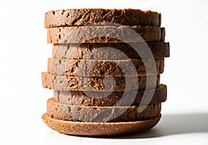 Stack of dark brown bread slices