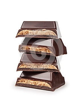 Stack of dark chocolate pieces with filling