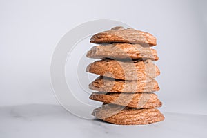 Stack of delicious golden brown buttery cookies. photo