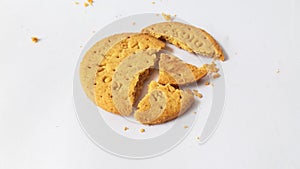 A stack of delicious wheat round biscuits with chocolate filling isolated on white background