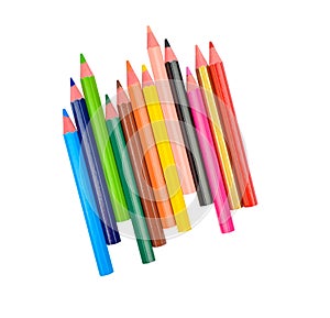 Stack of different colored wood pencil crayons scattered across a white background