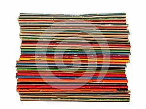 A stack of dimes novels isolated against a white background