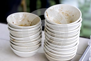 Stack of dirty dishes at a canteen or restaurant