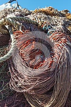 Stack of discarded fishing nets ropes