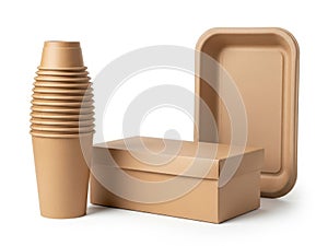 Stack of disposable cups, box, and tray isolated on white background