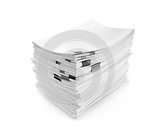 Stack of documents with black clips on white