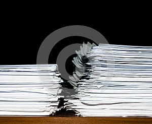 Stack of documents or files, overload of paperwork