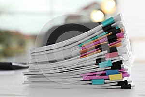 Stack of documents with paper clips