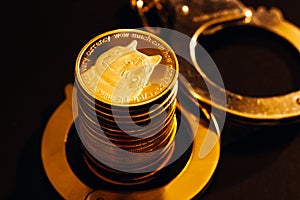 Stack of dogecoins and handcuffs