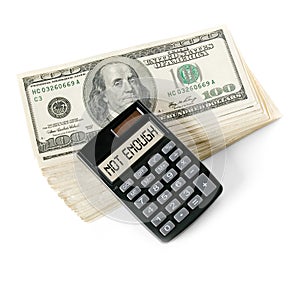 Stack of dollars and calculator isolated on white background