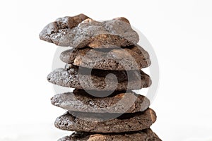 Stack of double chocolate chip cookies isolated on white background