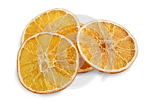 Stack of dried orange slices isolated on white