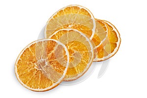 Stack of dried orange slices isolated on white