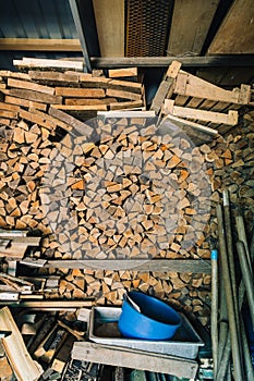 Stack of dry firewoods indoor