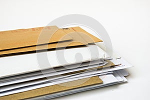 Stack of envelopes with copy space on a white background