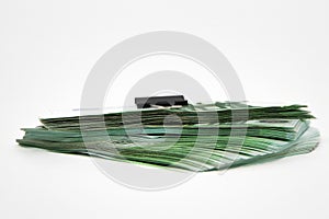 Stack of 100 Euro Banknotes Clipped with Binder