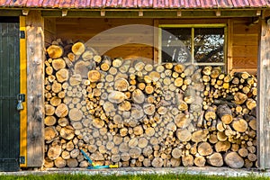 Stack of firewood in a barn