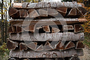 Stack of firewood. Pile of wood logs ready for winter