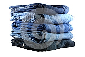 Stack of five blue jeans photo