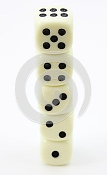 Stack of five dice, showing one to six