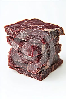 Stack of Five Fresh Raw Beef Steaks on White Background