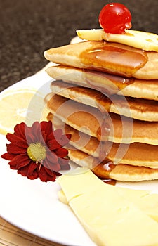 Stack of flapjacks with syrup