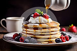 Stack fluffy pancakes topped with syrup, berries, and a dollop of whipped cream. Morning vibes for sweet food lovers