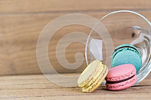 Stack Focus Image Of Colorful French Macarons On Wooden background