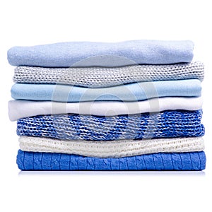 Stack folded blue shirt clothing