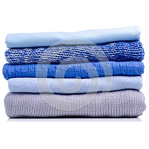 Stack folded blue shirt clothing