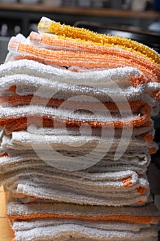 stack of folded cloth hand towels