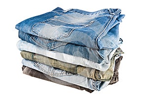 Stack of folded clothes, blue jeans pants, dark blue denim trousers