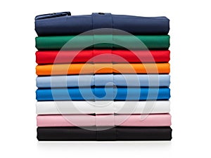 Stack of folded clothes, isolated on white background