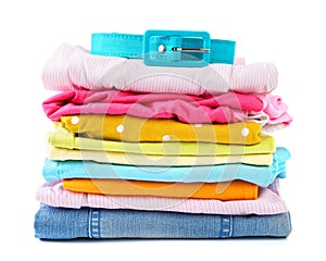 Stack of folded colorful clothes for children and teens