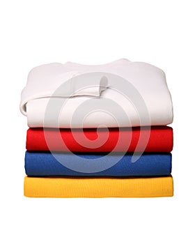 Stack of folded sweat shirts isolated on white background photo