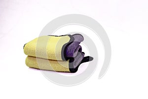 Stack of Folded Yellow and Gray Microfiber Cloths