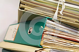 Stack of folders with archival documents photo