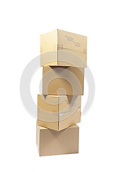 Stack of Four Blank Cardboard Shipping Boxes Isolated on White