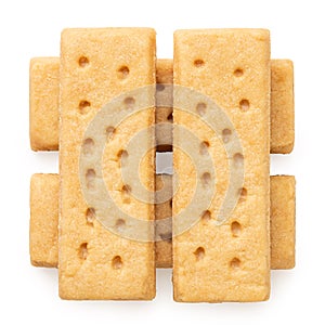 Stack of four butter shortbread finger biscuits from above