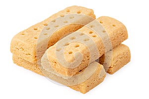 Stack of four butter shortbread finger biscuits photo