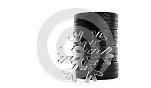 Stack of four car tires over white background with abstract snowflake, winter tire or snow tire concept