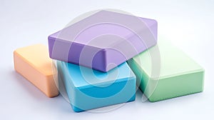 A stack of four different colored foam blocks