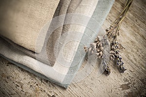 Stack of Four Folded Dull-Colored Cotton Fabric