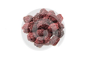 Stack of freeze dried raspberries isolated on white background. Dietary food