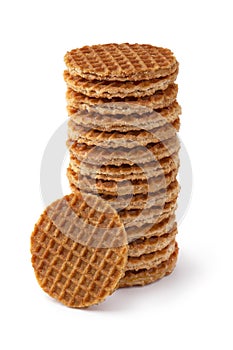 Stack of fresh baked mini stroopwafels, syrup waffles, isolated on white background